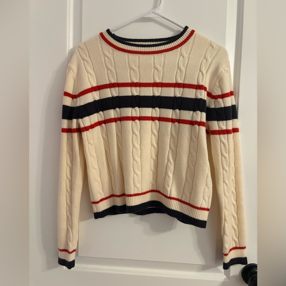 Red, white, and blue thick cable knit sweater